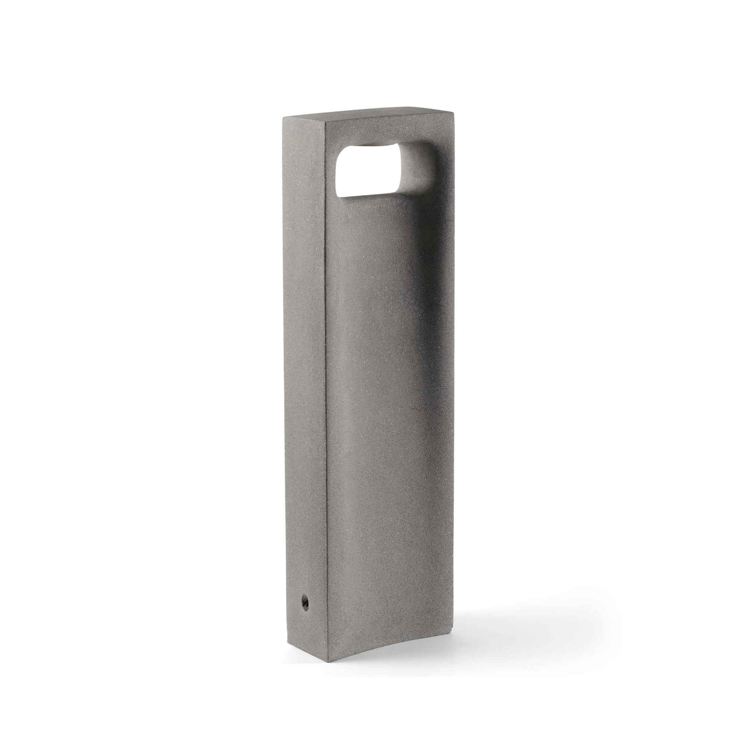 GLINT est une borne en béton au design minimaliste qui offre une lumière bidirectionnelle