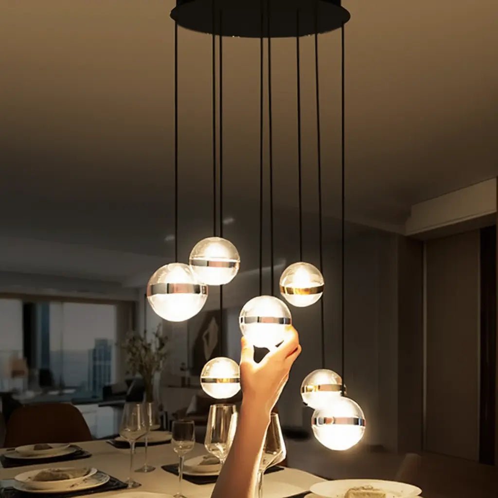 Lustre GALAXY 6 lampes : éclat cosmique pour votre intérieur en situation dans une salle à manger