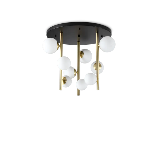 Plafonnier PERLAGE en métal finition laiton et noire avec traitement époxy. 9 sphères en verre blanc.