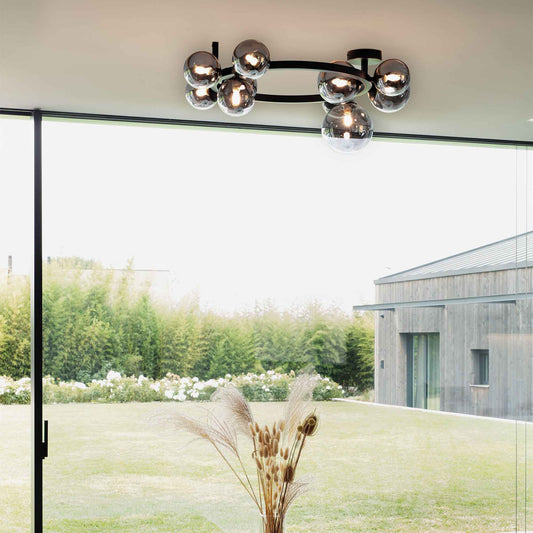 Plafonnier PERLAGE PL10 noire diffuseurs fumé - Luminosité élégante avec 10 sphères en pyrex fumé. Structure métal noir époxy robuste.